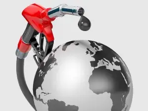 Illustration der Weltkugel, auf die ein Zapfhahn Öl träufelt